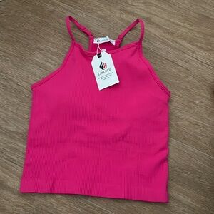 Women’s small pink ribbed hip length tank with built in bra. BNWT!